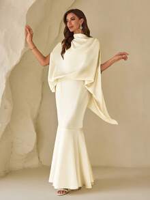 زي فستان عبارة عن قطعتين للمرأة سوليد كول حيث يرتكب من ملابس علوية بأكمام على شكل أجنحة الخفافيش وتنورة قصيرة بذيل السمكة - لون مشمشي - مشاهدة 1