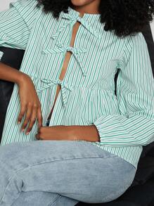 Camisa de mujer de moda casual con cuello redondo, lazo, bajo con volantes y mangas abullonadas en colores lisos