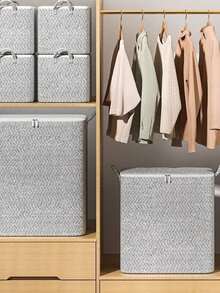 Una caja de almacenamiento plegable con asa, adecuada para organizar cosméticos. Cuenta con una gran capacidad hecha de tela no tejida y poliéster, diseñada con un elegante patrón gris a rayas, perfecta para la organización del armario. - Multicolor - Ver 6