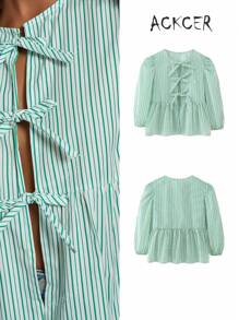 Camisa de mujer de moda casual con cuello redondo, lazo, bajo con volantes y mangas abullonadas en colores lisos