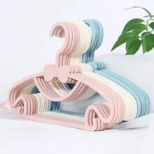 20 piezas de perchas de ropa de colores para niños, hechas de material PP, utilizadas para el almacenamiento de ropa y la exhibición portátil de pequeñas chaquetas y prendas, adecuadas para el almacenamiento de ropa en el hogar, tiendas de ropa, perchas para niños, con descuentos, se pueden usar para secar ropa de bebé, perchas de armario de guardería de plástico para bebés con diseño antideslizante y ultradelgado, para ropa de recién nacido y bebé, aplicable a la habitación de los niños y el almacenamiento de la guardería
