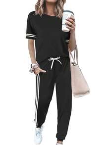 Bộ đồ thể thao mùa hè dành cho nữ, gồm áo ngắn tay kẻ sọc và quần ống rộng có túi bên hông, thích hợp mặc ở nhà hoặc dạo phố. Màu đen. - màu đen - Xem 9