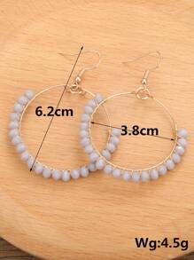 1 par de pendientes de gota con envoltorio de alambre de cobre y cristal para mujer