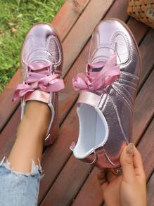 Nuove scarpe sportive casual da donna primavera-autunno 2025, con fiocco, di semplice e versatile stile fashion, di colori macaron