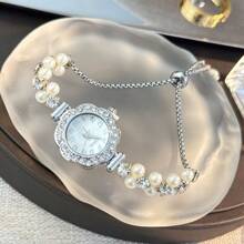 1 pièce Montre à quartz mode femme avec chaîne ajustable rétractable à double perle, boîtier en alliage, cadran avec chiffres arabes, design élégant pour femme et étudiante