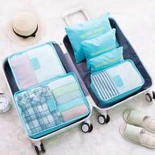 Juego de 8 cubos de embalaje impermeables para viaje: organizador de equipaje multitamaño para ropa, ropa interior, zapatos y artículos de tocador. Diseño ligero y resistente al desgarro para vacaciones familiares, camping y viajes en crucero. - Azul Cadete - Ver 7