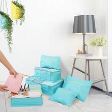 Juego de 8 cubos de embalaje impermeables para viaje: organizador de equipaje multitamaño para ropa, ropa interior, zapatos y artículos de tocador. Diseño ligero y resistente al desgarro para vacaciones familiares, camping y viajes en crucero. - Azul Cadete - Ver 2