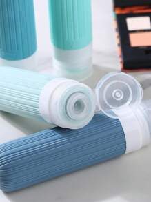 4 piezas Botellas de viaje para artículos de tocador, botellas de viaje a prueba de fugas, envases de silicona exprimibles, accesorios de viaje botellas recargables con bolsa de tocador, accesorios de viaje a prueba de fugas para líquidos y cosméticos como champú o loción. El color y algunos elementos se envían de forma aleatoria.