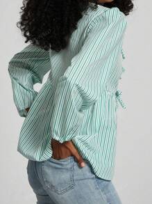 Camisa de mujer de moda casual con cuello redondo, lazo, bajo con volantes y mangas abullonadas en colores lisos