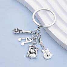 1 件男女通用音乐爱好者钥匙扣鼓套装吉他音符小号钢琴麦克风乐器 DIY 配件音乐节礼品袋饰品 - 銀色 - 查看 15