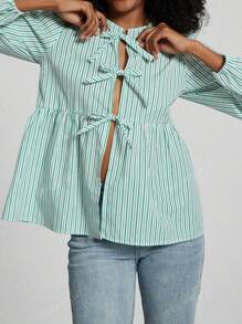 Camisa de mujer de moda casual con cuello redondo, lazo, bajo con volantes y mangas abullonadas en colores lisos