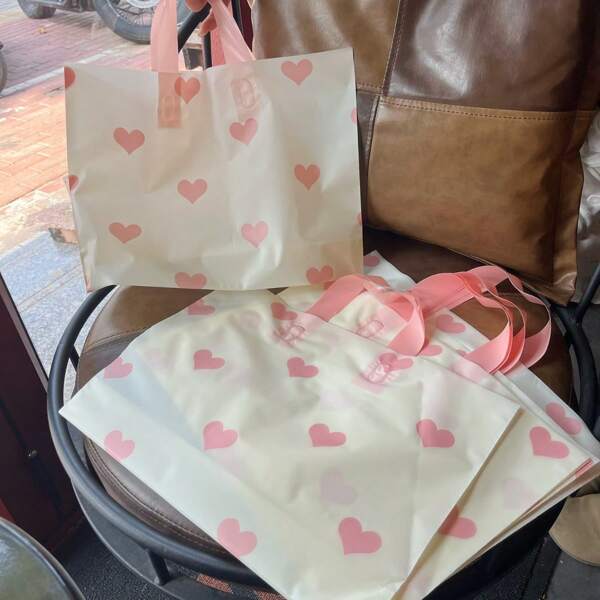 30 piezas/20 piezas Bolsas de regalo de plástico grueso con patrón de corazón - Perfectas para el Día de San Valentín, cumpleaños y empaque minorista
