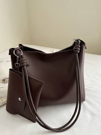 简约优雅的 PU 皮革手提包，时尚小众设计，高端氛围