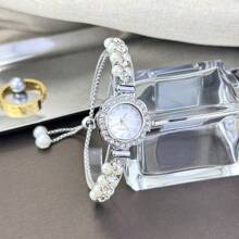 1 pièce Montre à quartz mode femme avec chaîne ajustable rétractable à double perle, boîtier en alliage, cadran avec chiffres arabes, design élégant pour femme et étudiante