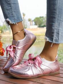 Nuove scarpe sportive casual da donna primavera-autunno 2025, con fiocco, di semplice e versatile stile fashion, di colori macaron