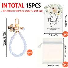 Bộ 15 móc khóa nơ và ngọc trai giả thanh lịch, bao gồm móc khóa, thiệp cảm ơn và túi vải organza trắng, lý tưởng làm quà tặng cô dâu, sinh nhật và đám cưới. - nơ - Xem 9