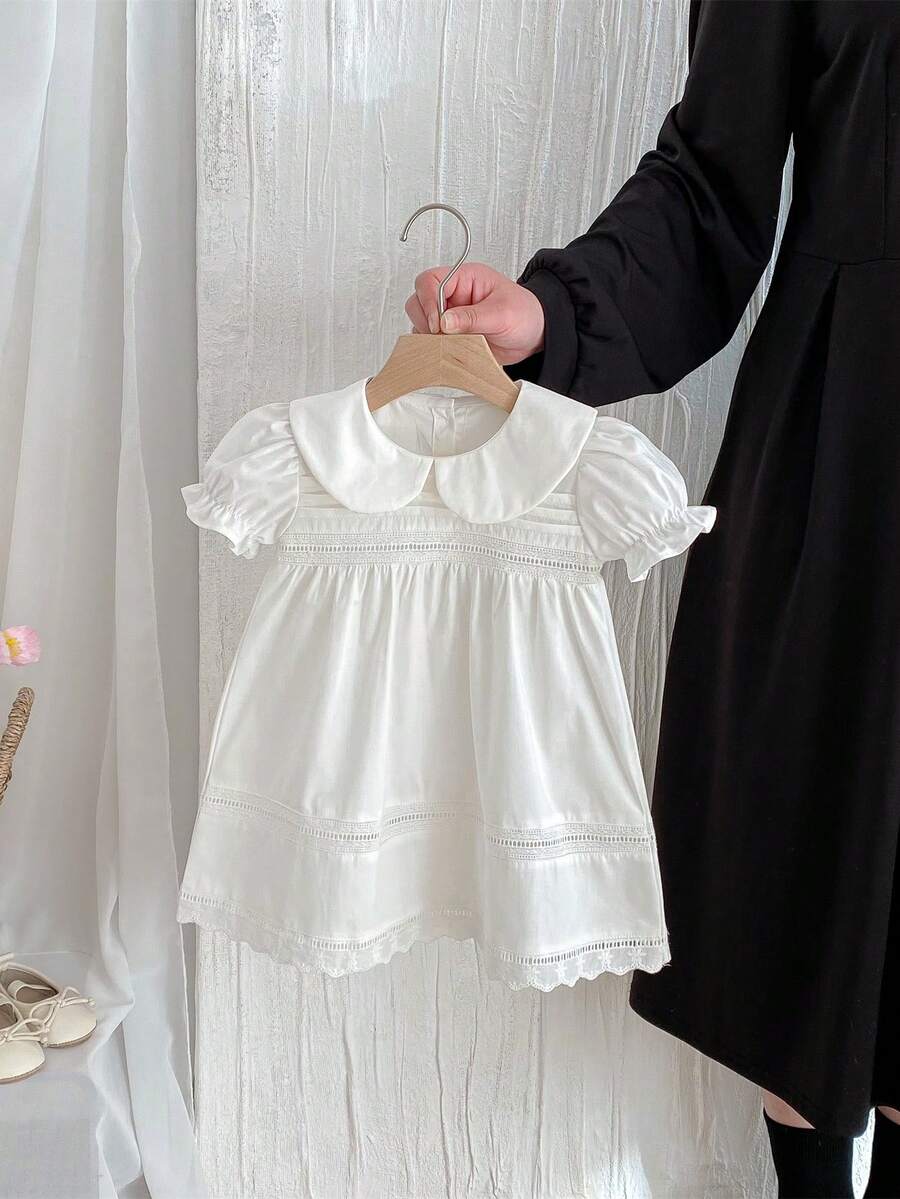 夏季少女蕾丝边镂空格纹翻领白色连衣裙
