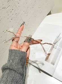 Unisex Simple Metal Spring Rimless Cat Eye Clear Lens Glasses