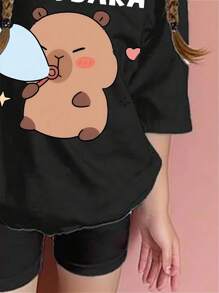 Young Girl Cartoon Graphic Print Short Sleeve T-Shirt And Bike Shorts Set