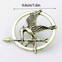 1pc The Katniss Everdeen Cosplay Prop Replica Mockingjay Pin For Hunger Games Movie Enthusiasts - A Symbol Of Rebellion And Hope
