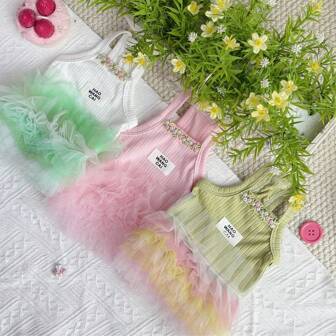 A Cute Summer Princess Dress Is Available In Three Colors. The Hem Is Decorated With Tulle And The Neckline Features Small Flower Embroidery. It Looks Very Adorable And Elegant When Worn.
