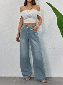 Pantalones vaqueros rectos y sueltos de diseño casual de primavera y verano con botones en diagonal para mujeres, estilo retro azul