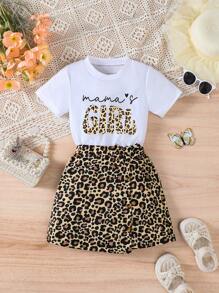 Set de 2 piezas de ropa informal de verano para niñas, camiseta de cuello redondo de manga corta con estampado de letras y leopardo, y falda asimétrica con decoración de lazo de estampado de leopardo, apropiada para uso al aire libre, en la escuela, fiestas y uso diario