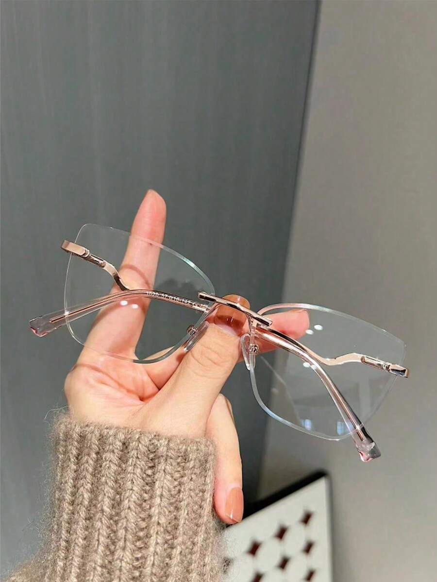 Unisex Simple Metal Spring Rimless Cat Eye Clear Lens Glasses