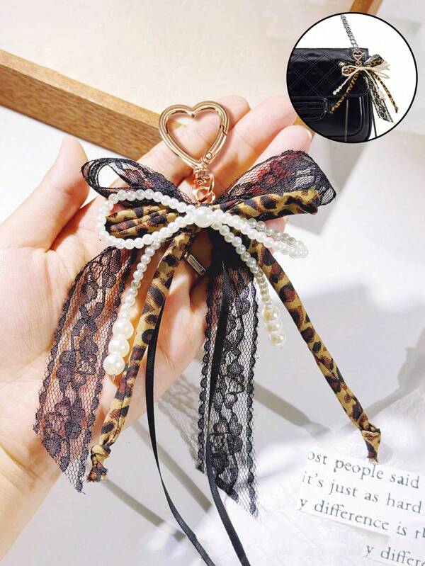 Ladies' Leopard Print And Faux Pearl Bow Keychain,Lace Bow Pearl Pendant - An Elegant Metal Accessory Suitable For Backpacks, Wallets, And Phone Cases,Y2k Style Sweet And Cool Couple Pendant,Bowling Bag, Handbag, Shoulder Bag Ornament,Party Gifts, Graduation, Birthdays, New Year's Gifts,Gift To Couples, Family, Friends, And Classmates