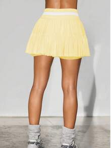 Falda plisada de cintura alta a rayas y parches estilo europeo y americano para mujeres, nueva colección de verano para deportes y yoga, con shorts incorporados - Amarillo - Ver 2