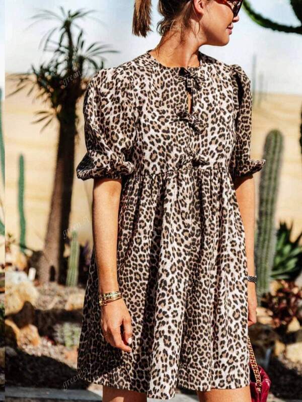 Elegant Plus-Size Lady's Short-Sleeved Dress With A Leopard Pattern, A Small Round Neck, And A Front Tie