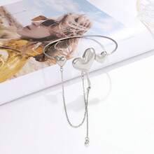 1 pièce Bracelet manchette avec chaîne et pompon en forme de cœur, style européen et américain. Bracelet chic et doux