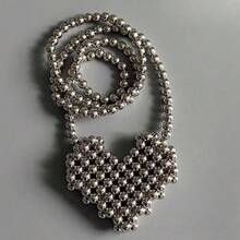 Silver Collection With Beads, Girl Holding Collection Of Hand-Woven Beads - Silver Love Bag [finished Product] - View 3