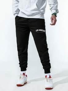 1 pieza Pantalones deportivos largos de unicolor con cordón en la cintura para hombres, pantalones básicos negros de fitness para primavera - Negro - Ver 4