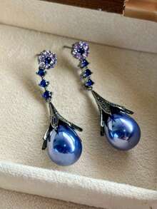 1 对优雅复古法式宫廷风泪滴珍珠耳环，轻盈奢华，长款设计，修饰脸型，适合日常和通勤佩戴