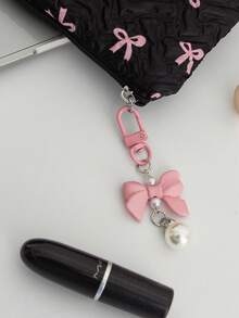 1个可爱荷叶边方形零钱包，带蝴蝶结图案，迷你口红收纳袋，可拆卸蝴蝶结吊坠，便携式拉链化妆包，柔软面料卫生巾收纳袋，时尚手拿包，可收纳钥匙、耳机、硬币、口红、润唇膏、卡片等小物件，适合女生配饰，是大学、邮轮、暑假旅行的必备单品。