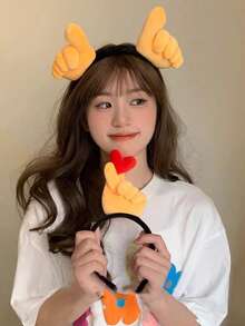 1个创意竖起大拇指的头箍，适合洗脸、派对、音乐会、音乐节等场合，可用作发饰，女士发箍。