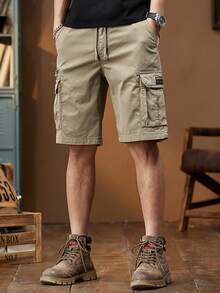 Sensual Star Pantalones cortos holgados de carga para hombres con bolsillos con solapa y cintura con cordón,pantalones cortos casuales tipo hawaiano, pantalones cortos sueltos tipo bermuda, pantalones cortos deportivos,color sólido, resistentes y ligeros, ideales para verano, uso diario, estilo outdoor y ropa casual - Caqui - Ver 1