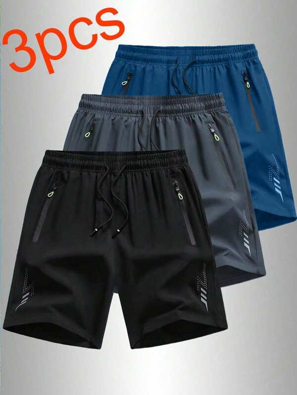 3 pares de pantalones cortos holgados y deportivos para hombre, de secado rápido, con diseño de tira reflectante, bolsillo, cremallera y cordón en la cintura, adecuados para fitness, running y actividades al aire libre.
