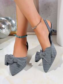 A Pair Of Striped Bow-Tipped High-Heeled Sandals, Girls' Spring And Summer Temperament, Light-Mouth Thin-Heeled Bag-Head Shoes, Empty Sandals Behind The Bag-Head.