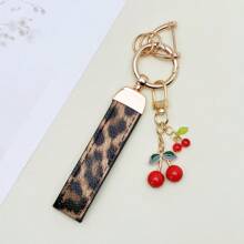 TTOBS 1 Llavero con estampado de leopardo hecho a mano con colgante de cereza - Práctico y versátil llavero ideal para mochilas. Regalo perfecto para el Día de San Valentín o para esa dama especial.