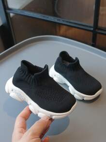 Zapatillas deportivas slip-on ligeras y cómodas de punto negro y blanco casuales para niños