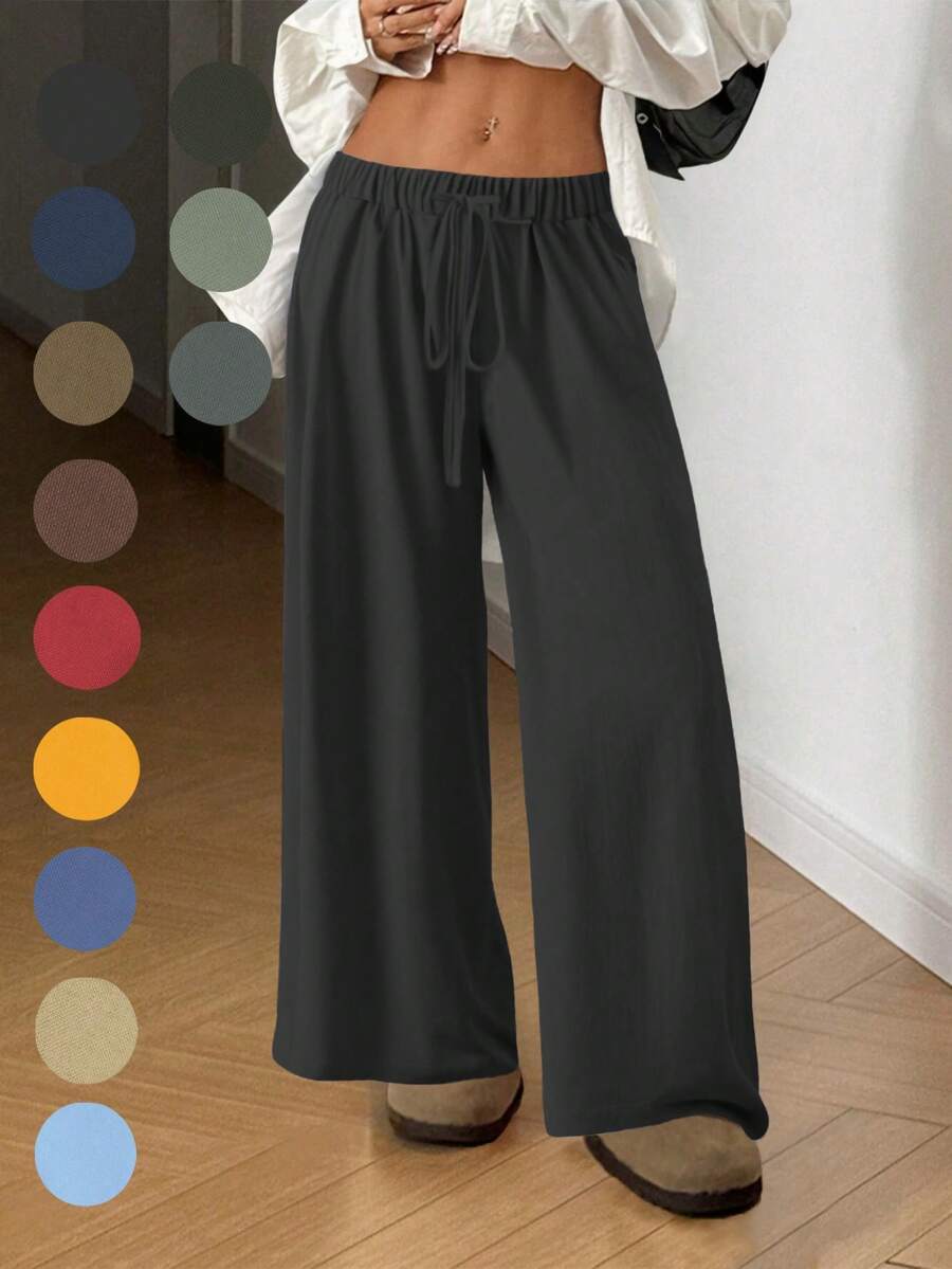 飘逸阔腿裤:轻盈梭织面料搭配弹性抽绳腰带,修身显瘦,通勤、购物、居家休闲皆宜。新款春秋季休闲女裤,适合约会、学生、日常出行等场合。百搭款式,休闲、海滩等各种场合皆可驾驭。抽绳腰带休闲女裤,适合外出和居家穿着。黑色 - 黑色 - 查看 1