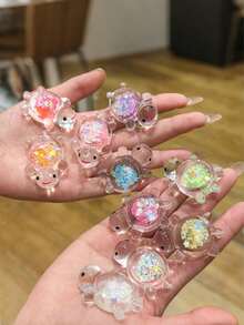 20pcs Luminous Mini Resin Turtles,Colorful Confetti Resin Turtle Statues,Luminous Glitter Sea Turtle Pendants,Sea Turtles Figurines Glow In The Dark Mini Resin Animals,Glow In The Dark Turtle Pendant,Embedded Shiny Sequins Design For DIY Jewelry Making, Necklace, Earrings, Keychain, Home Decor,Halloween Decorations - Multicolor - View 1