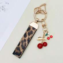 TTOBS 1pc Exquisitely Crafted Leopard Print Leather Car Key Chain With Adorable Cherry Pendant - , Fashionable And Multi-Functional Backpack Keychain - The Perfect Accessory For Backpacks. The Perfect Valentine's Day Gift, Also An Ideal Gift For Your Beloved Girlfriend.