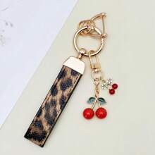 TTOBS 1 Llavero con estampado de leopardo hecho a mano con colgante de cereza - Práctico y versátil llavero ideal para mochilas. Regalo perfecto para el Día de San Valentín o para esa dama especial.