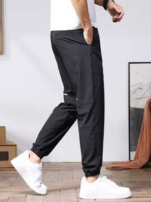 Męskie spodnie haremowe z elastyczną talią i kieszeniami, swobodne, oddychające, uniwersalne spodnie męskie do wypoczynku - Czarne - Zobacz 3