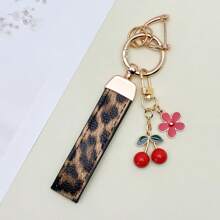TTOBS 1 Llavero con estampado de leopardo hecho a mano con colgante de cereza - Práctico y versátil llavero ideal para mochilas. Regalo perfecto para el Día de San Valentín o para esa dama especial.