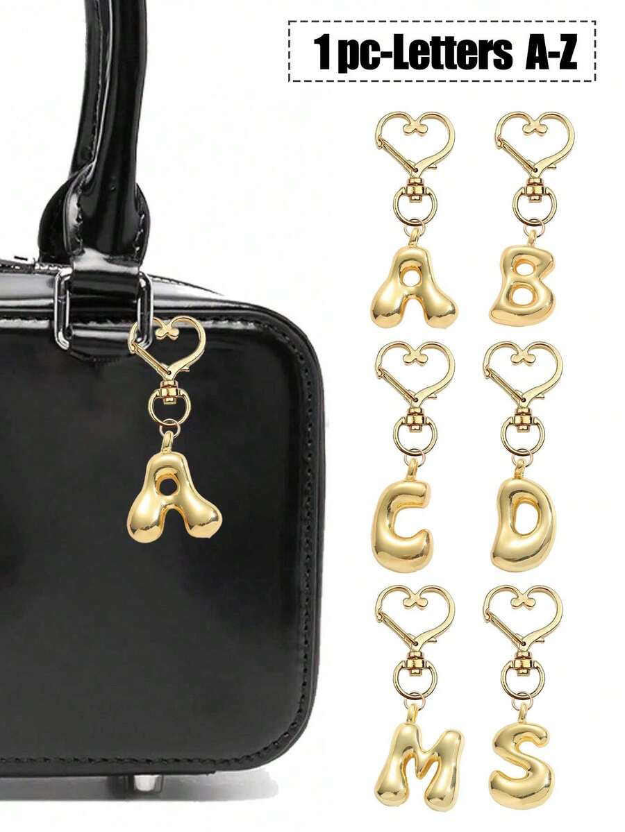 Colgante de letras del alfabeto en forma de burbuja lindas charms - Colgante de cristal de la suerte, letras de amor con cierre dorado de A a Z, colgante de aleación brillante para bolso y mochila - Regalo perfecto para cumpleaños y ocasiones especiales, llavero anillo colgante para bolso mochila coche, accesorios de billetera y bolso para mujeres y niñas - Dorado - Ver 1