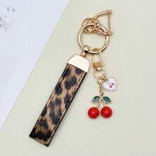 TTOBS 1 Llavero con estampado de leopardo hecho a mano con colgante de cereza - Práctico y versátil llavero ideal para mochilas. Regalo perfecto para el Día de San Valentín o para esa dama especial.